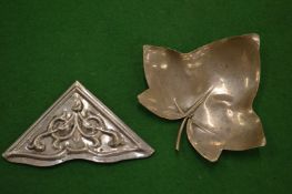 Small silver leaf shaped dish and another item.