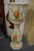 Floral decorated jardiniere on stand.