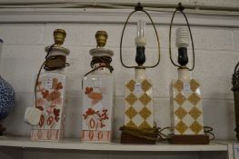 Two pairs of table lamps.