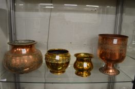 Eastern copperware together with two brass jardinieres.