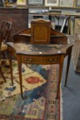 An Edwardian inlaid mahogany bonheur de jour.