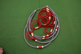 Two unusual necklaces.