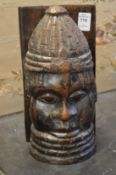 A Benin carved wood bust.