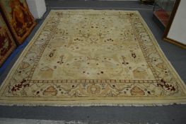 Indian carpet, cream ground with stylised floral decoration, 310cm x 250cm.