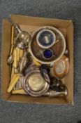 A box of silver and plated items.