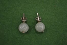 A pair of jade ear studs.