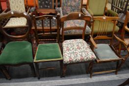 Four various chairs.