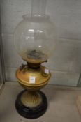 A brass oil lamp.