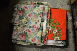 Floral decorated material and other items.