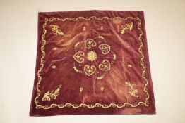 AN OTTOMAN GILT METAL THREADED RED VELVET TEXTILE, 90cm x 86cm.