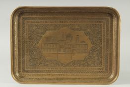 A FINE 19TH-20TH CENTURY PERSIAN QAJAR ENGRAVED BRASS TRAY, depicting a mosque with inscription,