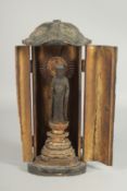 A SMALL JAPANESE GILDED CARVED WOOD BUTSUDAN, (af), 29cm high.