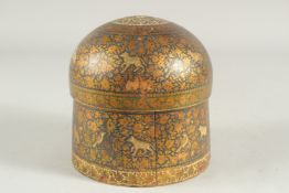 A FINE KASHMIR CIRCULAR TEA CADDY, with animals on a gilded floral background, 15cm diameter.