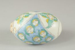 AN OTTOMA ARMENIAN POTTERY HANGING ORNAMENT, 11cm.