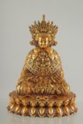 A FINE TIBETAN HEAVY GILT BRONZE BUDDHA, 11cm high.