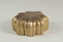 A 17TH-18TH CENTURY MUGHAL INDIAN LOTUS SHAPE BRASS PANDAN BOX, 14cm wide.