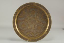A CAIROWARE SILVER AND COPPER INLAID BRASS TRAY, 34cm diameter.