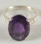 A GOOD 18CT WHITE GOLD AMETHYST AND DIAMOND RING.