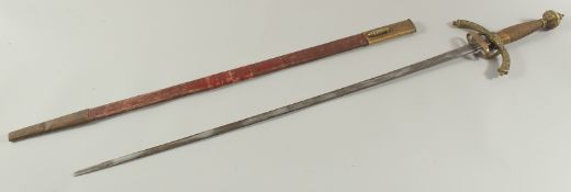 A GERMAN SWORD in a leather scabbard with brass handle. Inventory No. 10.1257. 40ins long.