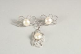 A PAIR OF WHITE GOLD PEAR AND DIAMOND EARRINGS AND PENDANT.