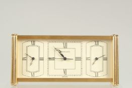A TIFFANY THREE DIAL CLOCK. 7ins long in a Tiffany box.