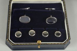 A STERLING SILVER CUFF LINK AND STUD SET.