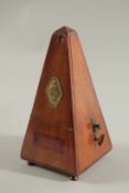 A FRENCH METRONOME, 'PAQUET'. 8.5ins high.