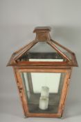 A COPPER, MIRRORED BACK LANTERN. 24ins high.