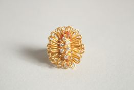 AN 18CT GOLD DIAMOND FANCY RING.