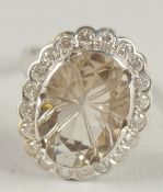 A SUPERB 18CT WHITE GOLD CITRINE AND DIAMOND CLUSTER RING.