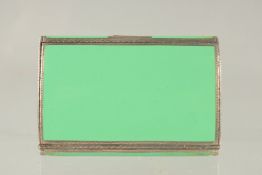 A GOOD SILVER AND GREEN ENAMEL SNUFF BOX.