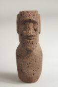 A CARVED LAVA STONE POLYNESIAN MAN. 5ins.