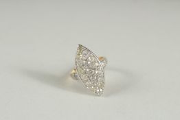 AN 18CT WHITE GOLD AND DIAMOND MARQUISE SHAPE PAVE SET RING.
