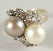 A 14CT WHITE GOLD, PEARL AND DIAMOND RING.