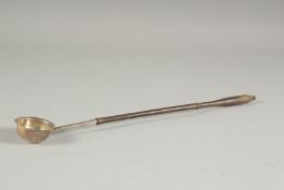 A GEORGE III SILVER TODY LADLE with wooden handle. Edinburgh, circa. 1800.