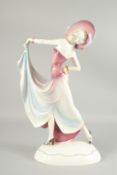 A LARGE DECO PORCELAIN LADY. 19ins high.