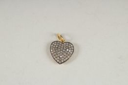 A VICTORIAN ROSE CUT HEART SHAPED PENDANT.