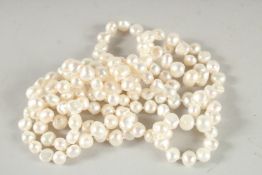 A GOOD CULTURED PEARL NECKLACE. 48ins long.
