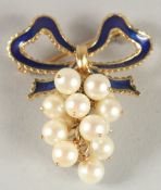 A 14CT GOLD BLUE ENAMEL AND PEARL BROOCH.