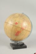 A PHILIPS 10INS CHALLENGER GLOBE on a square base.