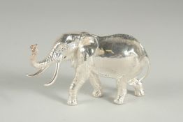 A STIRLING SILVER SOLID CAST ELEPHANT.