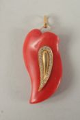 A GOOD CORAL DIAMOND SET TEAR DROP PENDANT.
