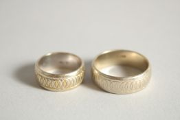 TWO 18CT GOLD WEDDING BANDS. 12gms.