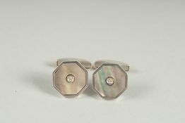 A PAIR OF STERLING SILVER MOTHER OF PEARL AND DIAMOND CUFF LINKS.