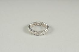AN 18CT WHTIE GOLD AND DIAMOND FULL ETERNITY RING.