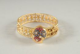 A SUPERB 18CT GOLD OMEGA DIAMOND, SAPPHIRE AND RUBY COCKTAIL WATCH.