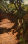 John White (1851-1933) British, A young boy lying against a bank on a pathway beneath trees in the