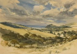 Keith Andrew (20th Century) An extensive rural landscape looking towards the sea with sheep in the