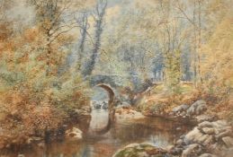 E. Salter (19th Century) A river scene with a stone bridge and a figure, large rocks and trees