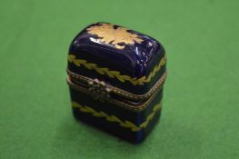 A small porcelain box.